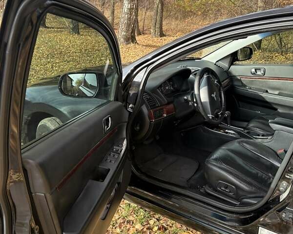 Черный Мицубиси Галант, объемом двигателя 2.4 л и пробегом 209 тыс. км за 6700 $, фото 12 на Automoto.ua