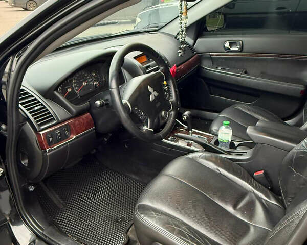 Черный Мицубиси Галант, объемом двигателя 2.38 л и пробегом 250 тыс. км за 6200 $, фото 1 на Automoto.ua