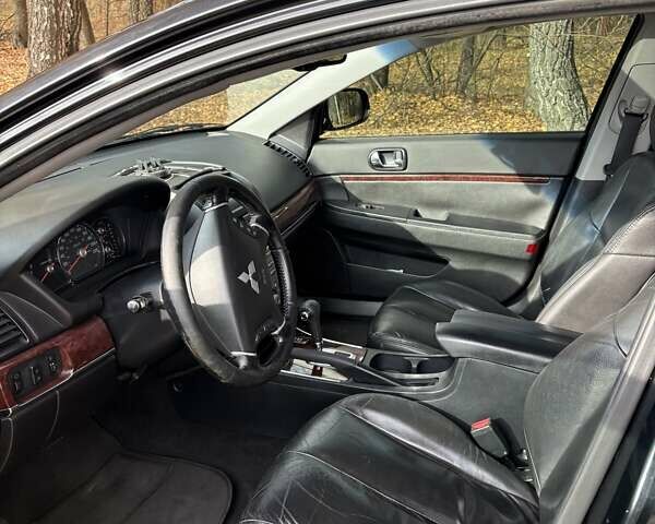 Черный Мицубиси Галант, объемом двигателя 2.4 л и пробегом 209 тыс. км за 6700 $, фото 13 на Automoto.ua