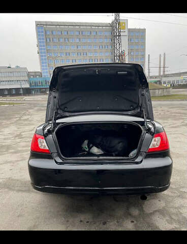 Черный Мицубиси Галант, объемом двигателя 2.38 л и пробегом 250 тыс. км за 6200 $, фото 4 на Automoto.ua