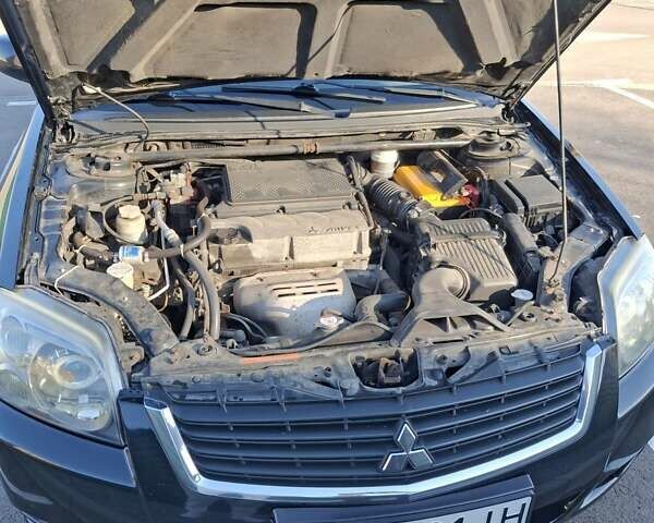 Чорний Міцубісі Галант, об'ємом двигуна 2.38 л та пробігом 220 тис. км за 6100 $, фото 4 на Automoto.ua