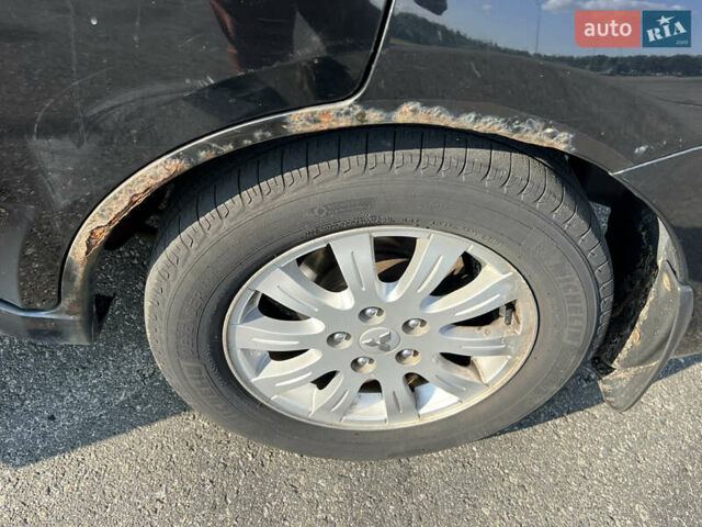 Черный Мицубиси Галант, объемом двигателя 2.4 л и пробегом 462 тыс. км за 5000 $, фото 12 на Automoto.ua