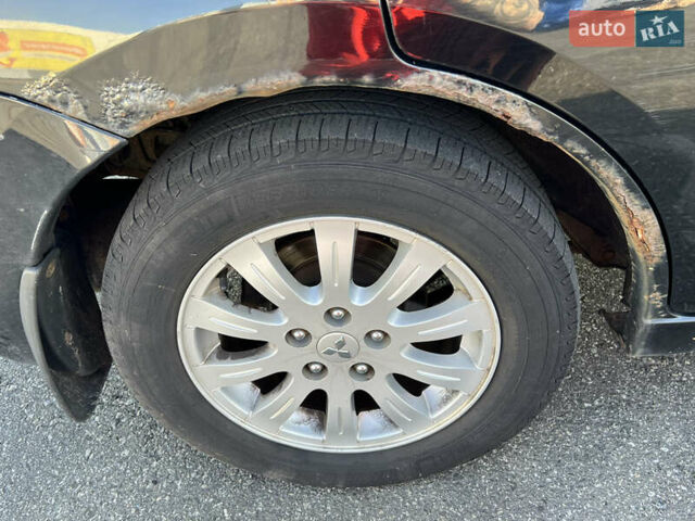 Черный Мицубиси Галант, объемом двигателя 2.4 л и пробегом 462 тыс. км за 5000 $, фото 9 на Automoto.ua