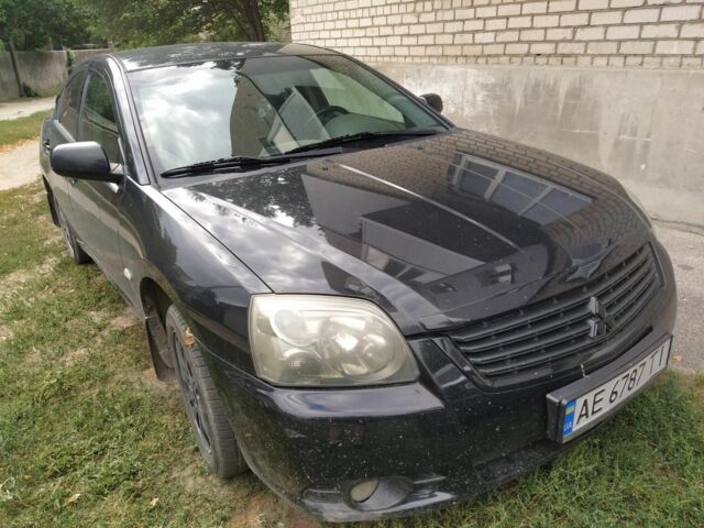 Черный Мицубиси Галант, объемом двигателя 2.4 л и пробегом 220 тыс. км за 5300 $, фото 1 на Automoto.ua