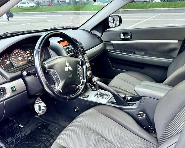 Черный Мицубиси Галант, объемом двигателя 2.38 л и пробегом 191 тыс. км за 6500 $, фото 4 на Automoto.ua