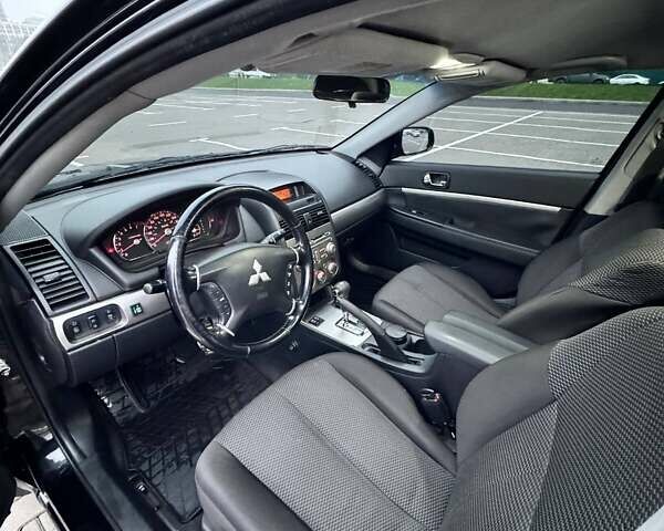 Черный Мицубиси Галант, объемом двигателя 2.38 л и пробегом 191 тыс. км за 6500 $, фото 12 на Automoto.ua