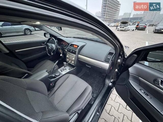 Черный Мицубиси Галант, объемом двигателя 2.38 л и пробегом 191 тыс. км за 6500 $, фото 10 на Automoto.ua