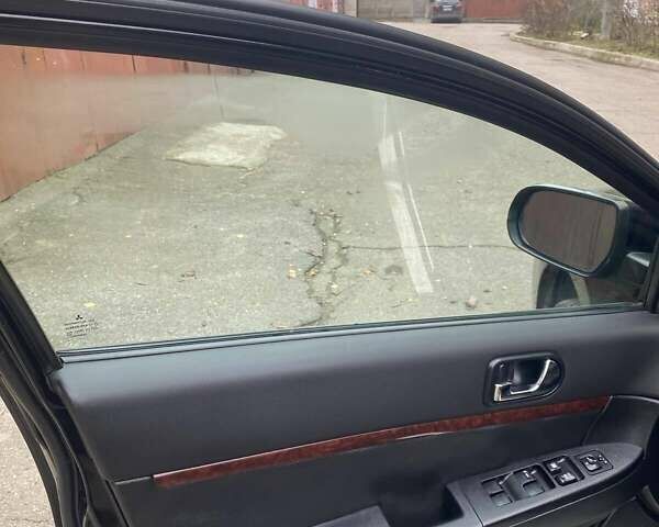 Черный Мицубиси Галант, объемом двигателя 2.38 л и пробегом 168 тыс. км за 6500 $, фото 9 на Automoto.ua