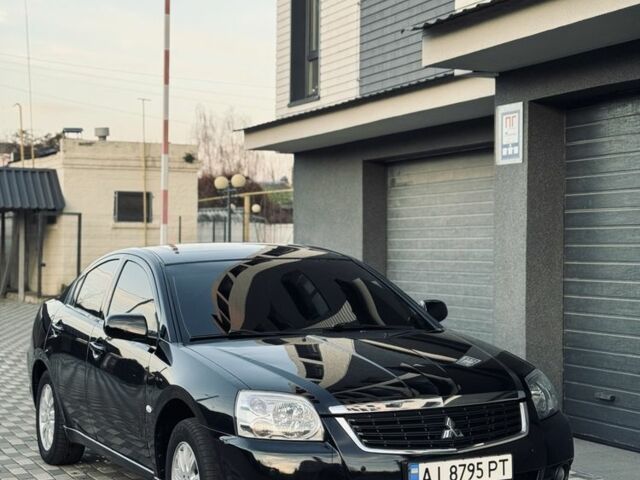 Черный Мицубиси Галант, объемом двигателя 2.4 л и пробегом 139 тыс. км за 8900 $, фото 1 на Automoto.ua