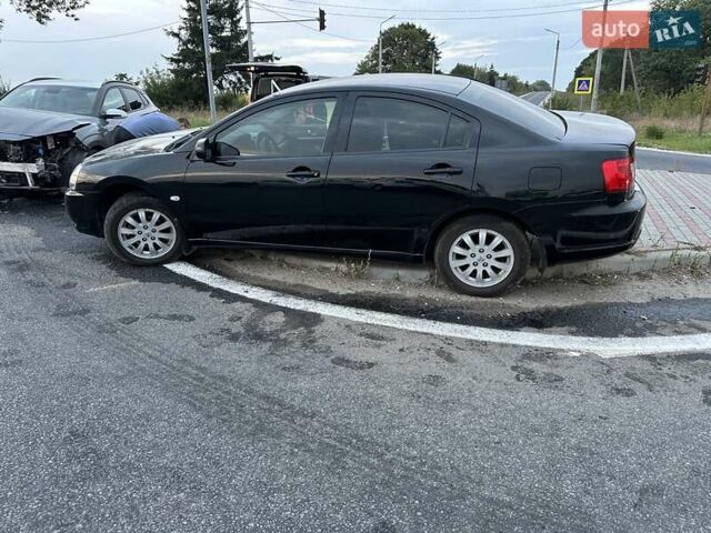 Черный Мицубиси Галант, объемом двигателя 2.4 л и пробегом 220 тыс. км за 1800 $, фото 1 на Automoto.ua