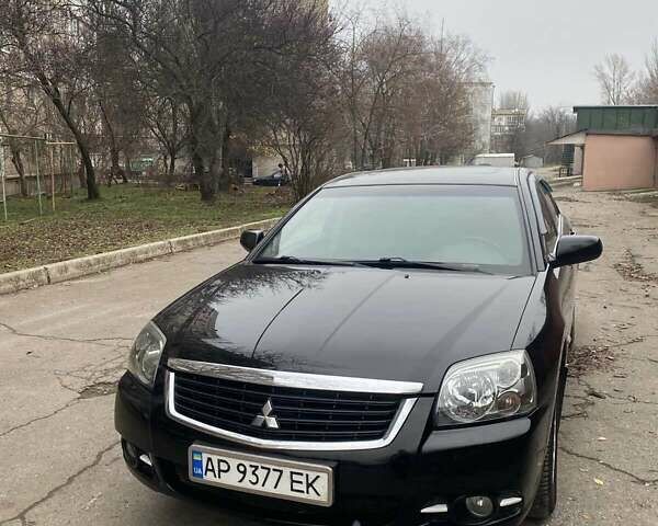 Черный Мицубиси Галант, объемом двигателя 2.38 л и пробегом 168 тыс. км за 6500 $, фото 2 на Automoto.ua