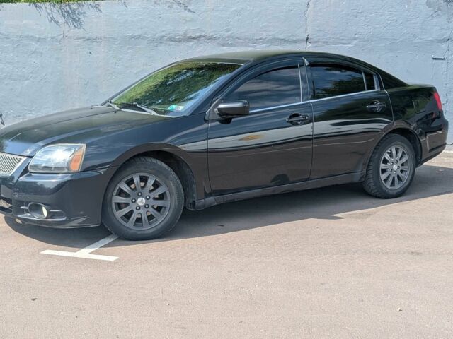 Черный Мицубиси Галант, объемом двигателя 2.4 л и пробегом 345 тыс. км за 3999 $, фото 1 на Automoto.ua