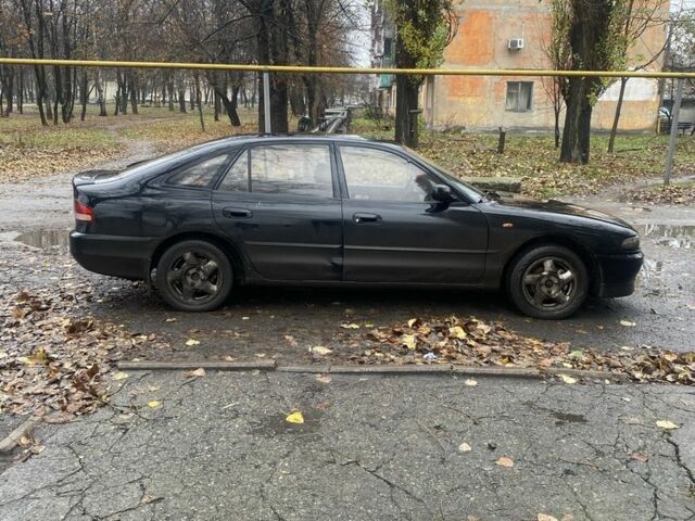 Черный Мицубиси Галант, объемом двигателя 2 л и пробегом 349 тыс. км за 1500 $, фото 3 на Automoto.ua