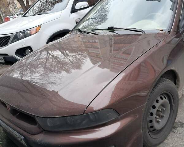 Коричневый Мицубиси Галант, объемом двигателя 2.4 л и пробегом 300 тыс. км за 3000 $, фото 4 на Automoto.ua