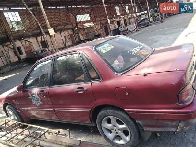 Красный Мицубиси Галант, объемом двигателя 2 л и пробегом 400 тыс. км за 1298 $, фото 5 на Automoto.ua