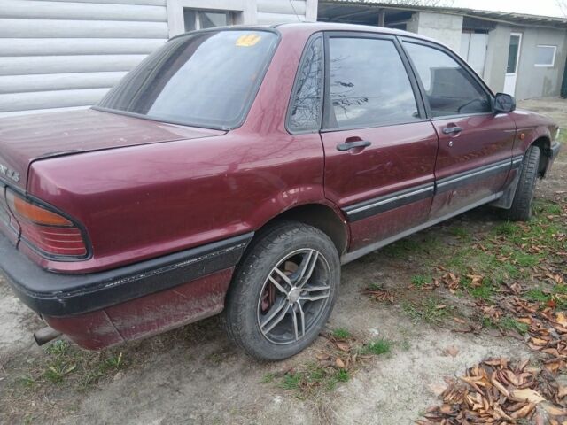 Червоний Міцубісі Галант, об'ємом двигуна 2 л та пробігом 327 тис. км за 1000 $, фото 2 на Automoto.ua