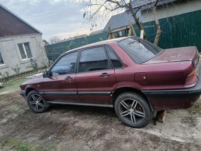 Червоний Міцубісі Галант, об'ємом двигуна 2 л та пробігом 327 тис. км за 1000 $, фото 1 на Automoto.ua
