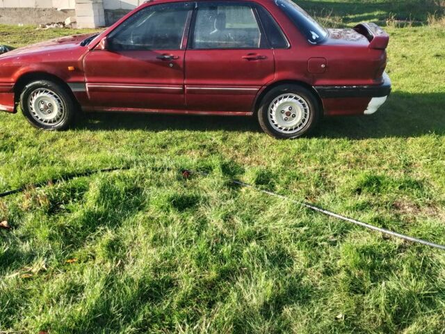 Красный Мицубиси Галант, объемом двигателя 2 л и пробегом 300 тыс. км за 1300 $, фото 4 на Automoto.ua