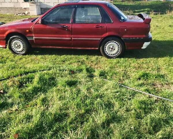 Червоний Міцубісі Галант, об'ємом двигуна 2 л та пробігом 300 тис. км за 850 $, фото 3 на Automoto.ua