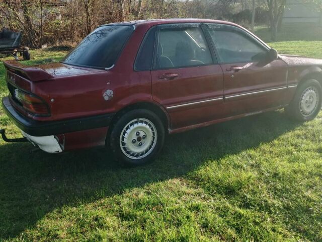 Красный Мицубиси Галант, объемом двигателя 2 л и пробегом 300 тыс. км за 1300 $, фото 2 на Automoto.ua