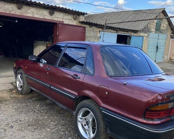 Червоний Міцубісі Галант, об'ємом двигуна 2 л та пробігом 218 тис. км за 1999 $, фото 2 на Automoto.ua