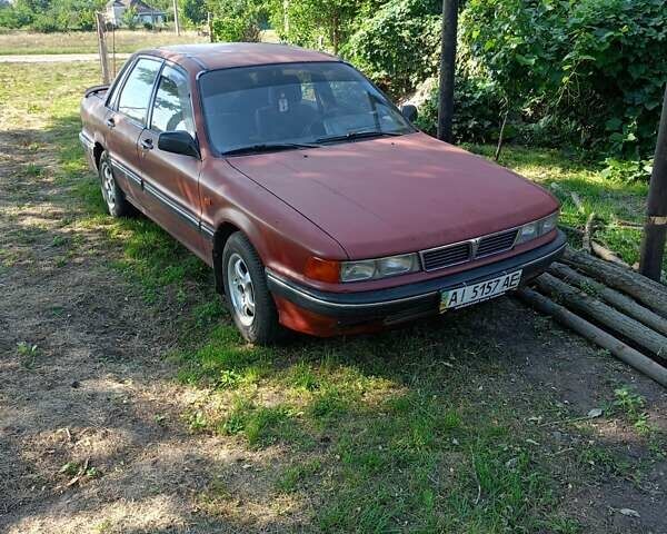 Красный Мицубиси Галант, объемом двигателя 1.8 л и пробегом 400 тыс. км за 999 $, фото 5 на Automoto.ua