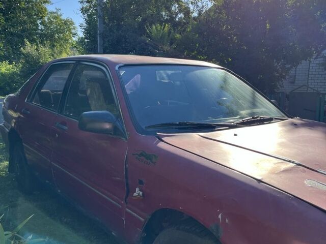 Красный Мицубиси Галант, объемом двигателя 1.6 л и пробегом 370 тыс. км за 500 $, фото 3 на Automoto.ua