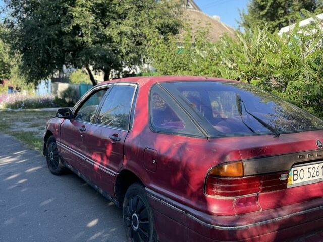 Красный Мицубиси Галант, объемом двигателя 1.6 л и пробегом 370 тыс. км за 500 $, фото 1 на Automoto.ua