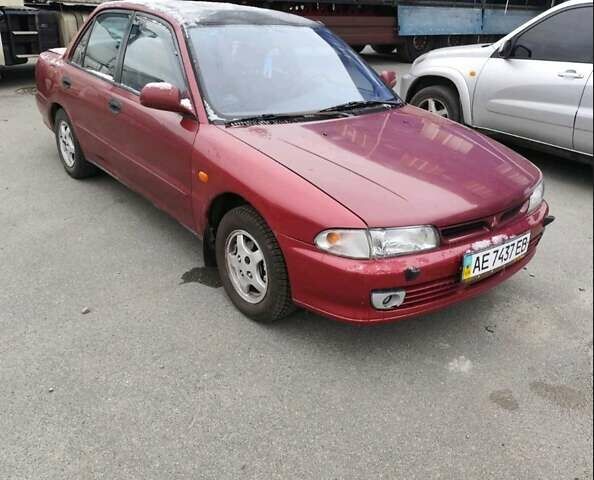 Красный Мицубиси Галант, объемом двигателя 1.6 л и пробегом 233 тыс. км за 2000 $, фото 2 на Automoto.ua