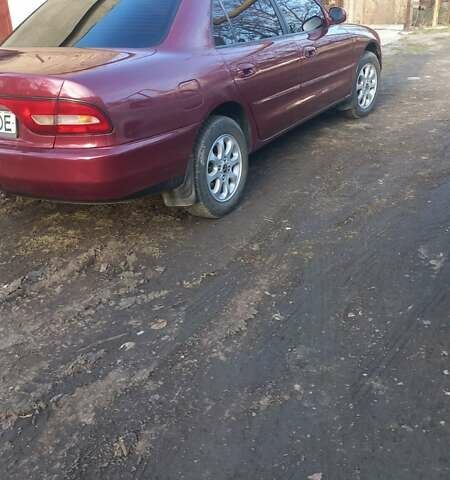 Красный Мицубиси Галант, объемом двигателя 2 л и пробегом 270 тыс. км за 2700 $, фото 3 на Automoto.ua