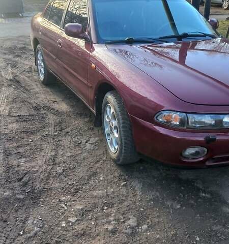 Красный Мицубиси Галант, объемом двигателя 2 л и пробегом 270 тыс. км за 2700 $, фото 2 на Automoto.ua