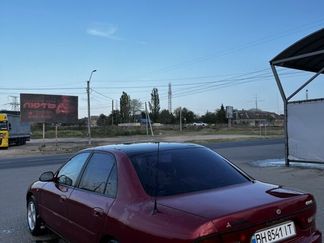 Красный Мицубиси Галант, объемом двигателя 2 л и пробегом 3 тыс. км за 2300 $, фото 3 на Automoto.ua