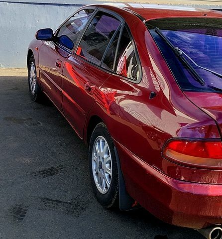 Красный Мицубиси Галант, объемом двигателя 2 л и пробегом 297 тыс. км за 2900 $, фото 3 на Automoto.ua