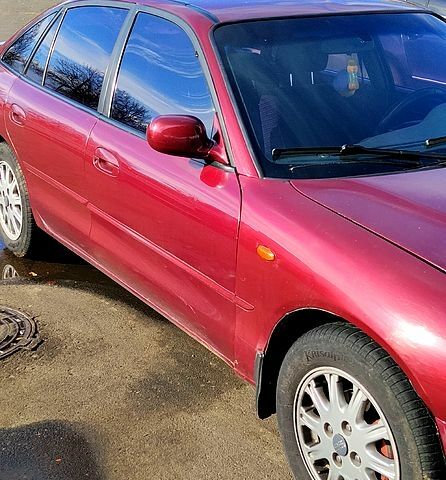 Красный Мицубиси Галант, объемом двигателя 2 л и пробегом 297 тыс. км за 2900 $, фото 2 на Automoto.ua