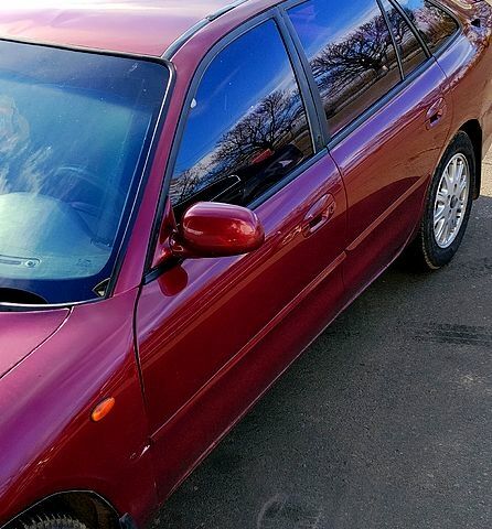 Красный Мицубиси Галант, объемом двигателя 2 л и пробегом 297 тыс. км за 2900 $, фото 1 на Automoto.ua