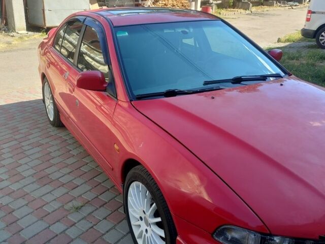 Червоний Міцубісі Галант, об'ємом двигуна 2.5 л та пробігом 300 тис. км за 3500 $, фото 4 на Automoto.ua