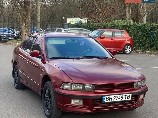Красный Мицубиси Галант, объемом двигателя 2.5 л и пробегом 350 тыс. км за 2850 $, фото 1 на Automoto.ua