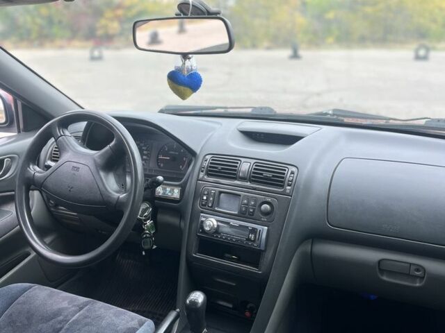 Красный Мицубиси Галант, объемом двигателя 2 л и пробегом 200 тыс. км за 2999 $, фото 13 на Automoto.ua