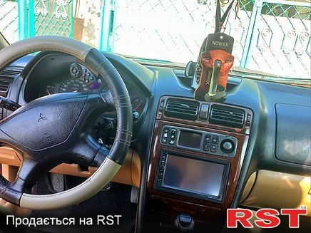 Красный Мицубиси Галант, объемом двигателя 2.5 л и пробегом 412 тыс. км за 3499 $, фото 1 на Automoto.ua