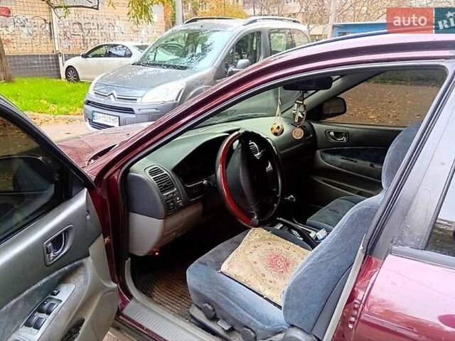 Червоний Міцубісі Галант, об'ємом двигуна 2 л та пробігом 190 тис. км за 2500 $, фото 1 на Automoto.ua