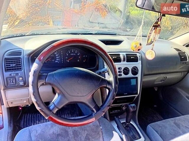 Червоний Міцубісі Галант, об'ємом двигуна 2 л та пробігом 190 тис. км за 2500 $, фото 2 на Automoto.ua