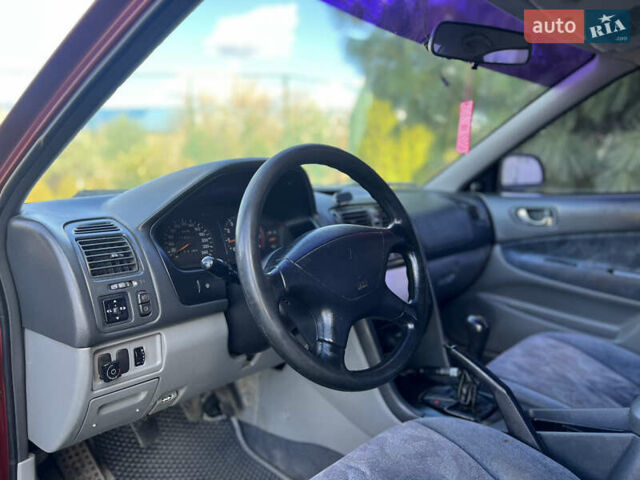 Мицубиси Галант 1999 в Жовкве на Automoto.ua Красный Мицубиси Галант, объемом двигателя 2 л и пробегом 245 тыс. км за 2450 $, фото 16 на Automoto.ua