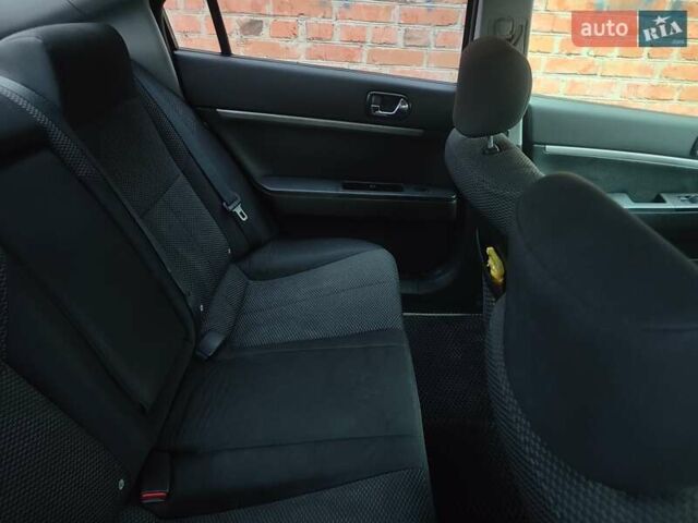 Червоний Міцубісі Галант, об'ємом двигуна 2.38 л та пробігом 235 тис. км за 4444 $, фото 7 на Automoto.ua