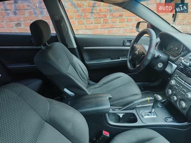 Червоний Міцубісі Галант, об'ємом двигуна 2.38 л та пробігом 235 тис. км за 4444 $, фото 6 на Automoto.ua