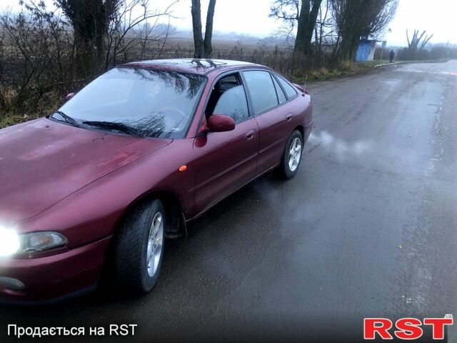 Червоний Міцубісі Галант, об'ємом двигуна 2 л та пробігом 250 тис. км за 2000 $, фото 1 на Automoto.ua