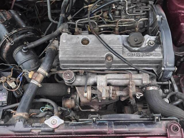 Красный Мицубиси Галант, объемом двигателя 2 л и пробегом 270 тыс. км за 2000 $, фото 4 на Automoto.ua