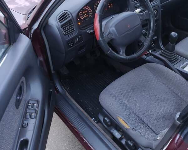 Красный Мицубиси Галант, объемом двигателя 2 л и пробегом 284 тыс. км за 1200 $, фото 8 на Automoto.ua