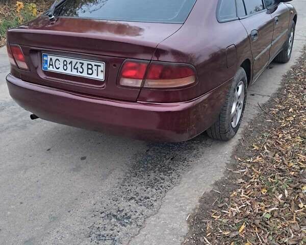 Красный Мицубиси Галант, объемом двигателя 2 л и пробегом 270 тыс. км за 2000 $, фото 1 на Automoto.ua