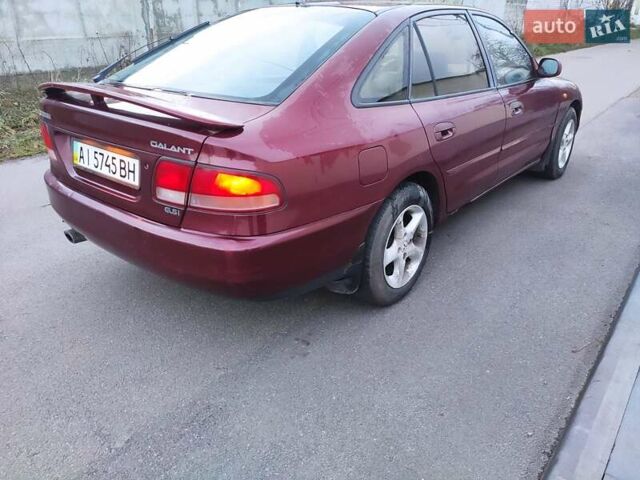 Красный Мицубиси Галант, объемом двигателя 2 л и пробегом 284 тыс. км за 1200 $, фото 4 на Automoto.ua