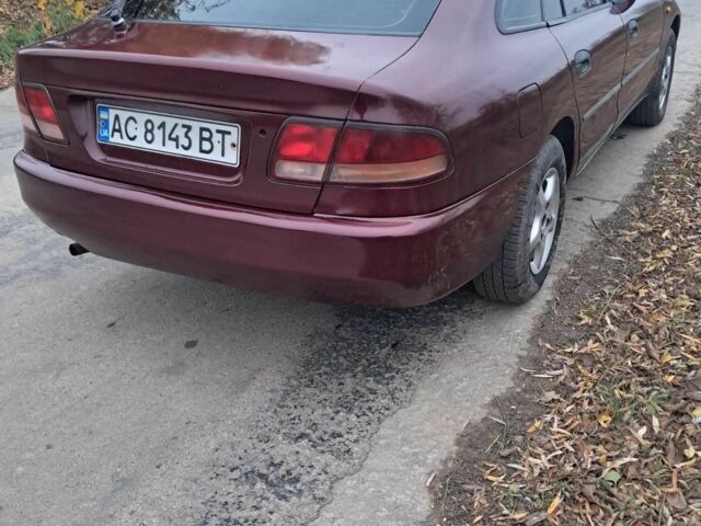 Красный Мицубиси Галант, объемом двигателя 2 л и пробегом 270 тыс. км за 2000 $, фото 1 на Automoto.ua